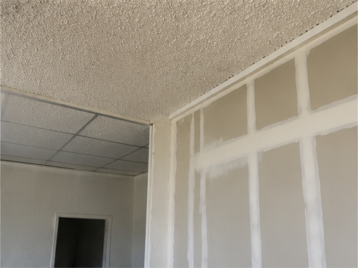 Interior ceiling and wall surfaces where asbestos may be present.